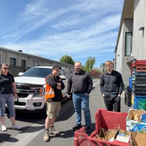 Vortex team donating items for the food bank